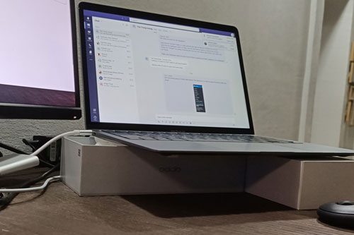 My MacBook resting on the makeshift platform.