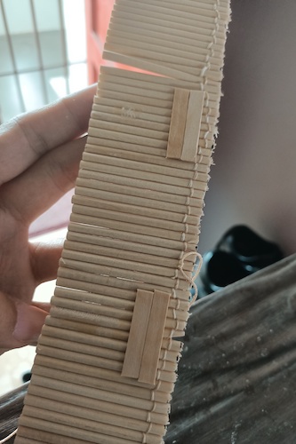 Binding with thread.