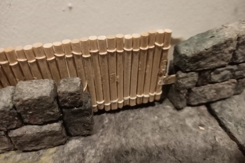 Slipping the fence<br />sections in.