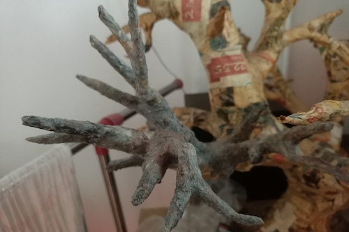 Adding a bark covering.