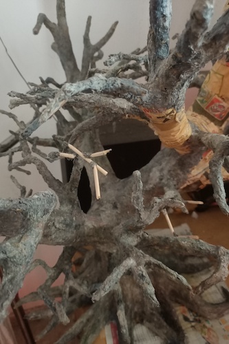Adding tiny branches from leftover pointed sticks.