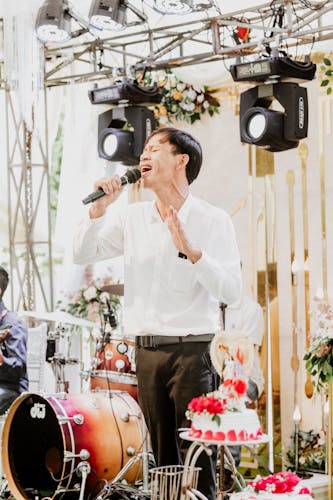 Singing badly.